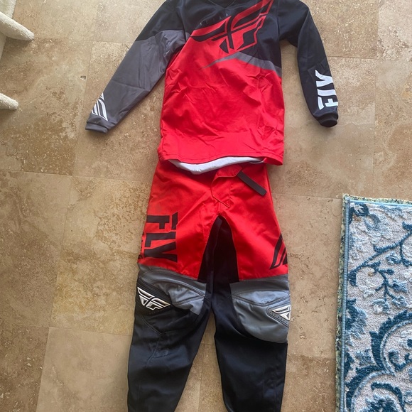 Kids BMX uniforms one YL and one YM (youth medium and large)